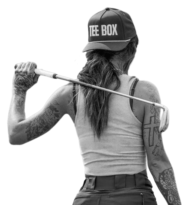 An image of a woman holding a golf club over her shoulder at Tee Box party facilities in Scottsdale, AZ. 