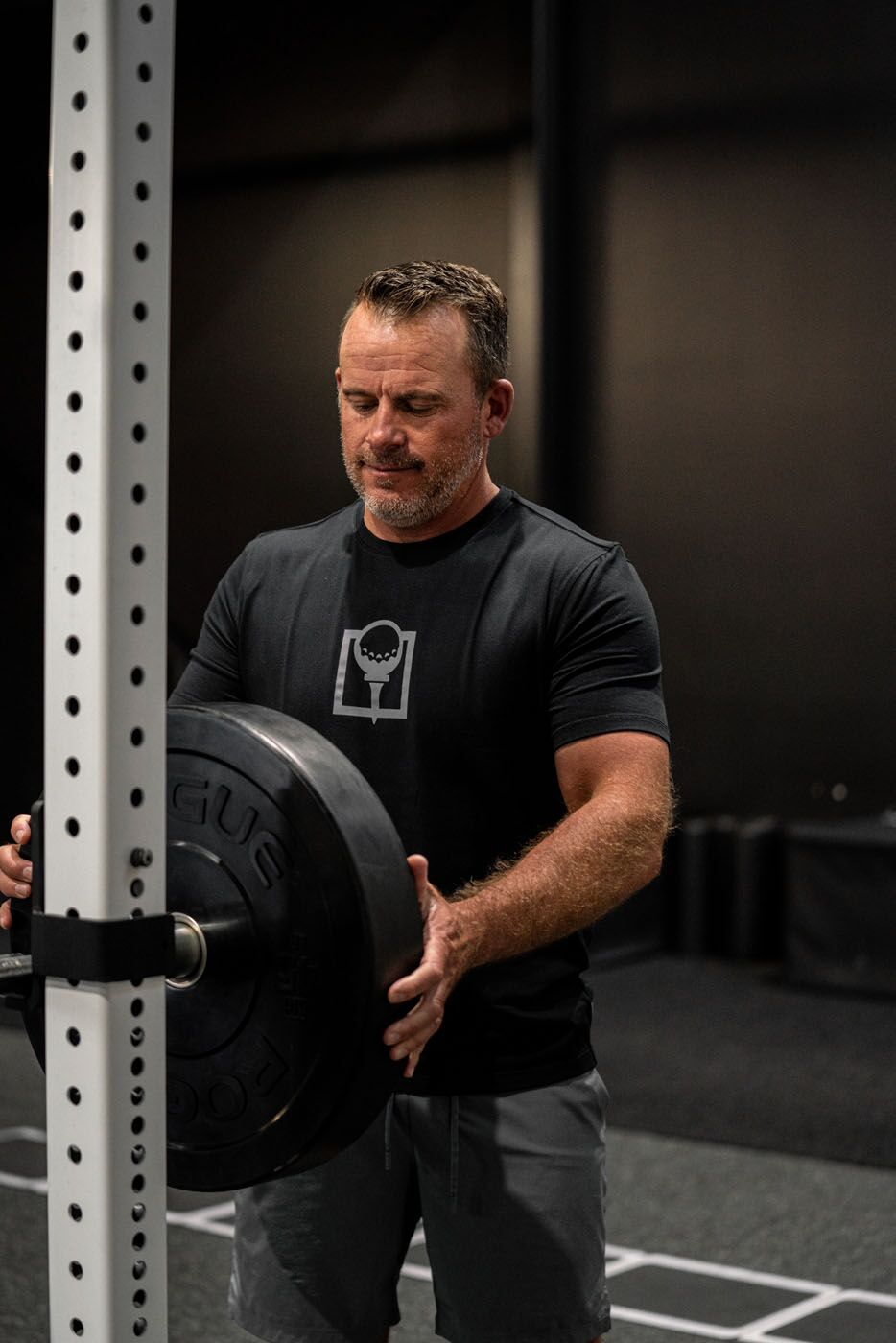 A golfer working on strength training in a Tee Box Oro Valley facility.