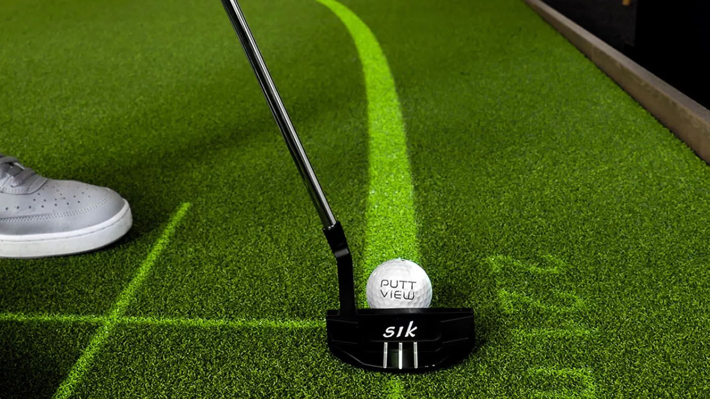 An image a putter and puttview golf ball used at Tee Box Delray Beach, FL.