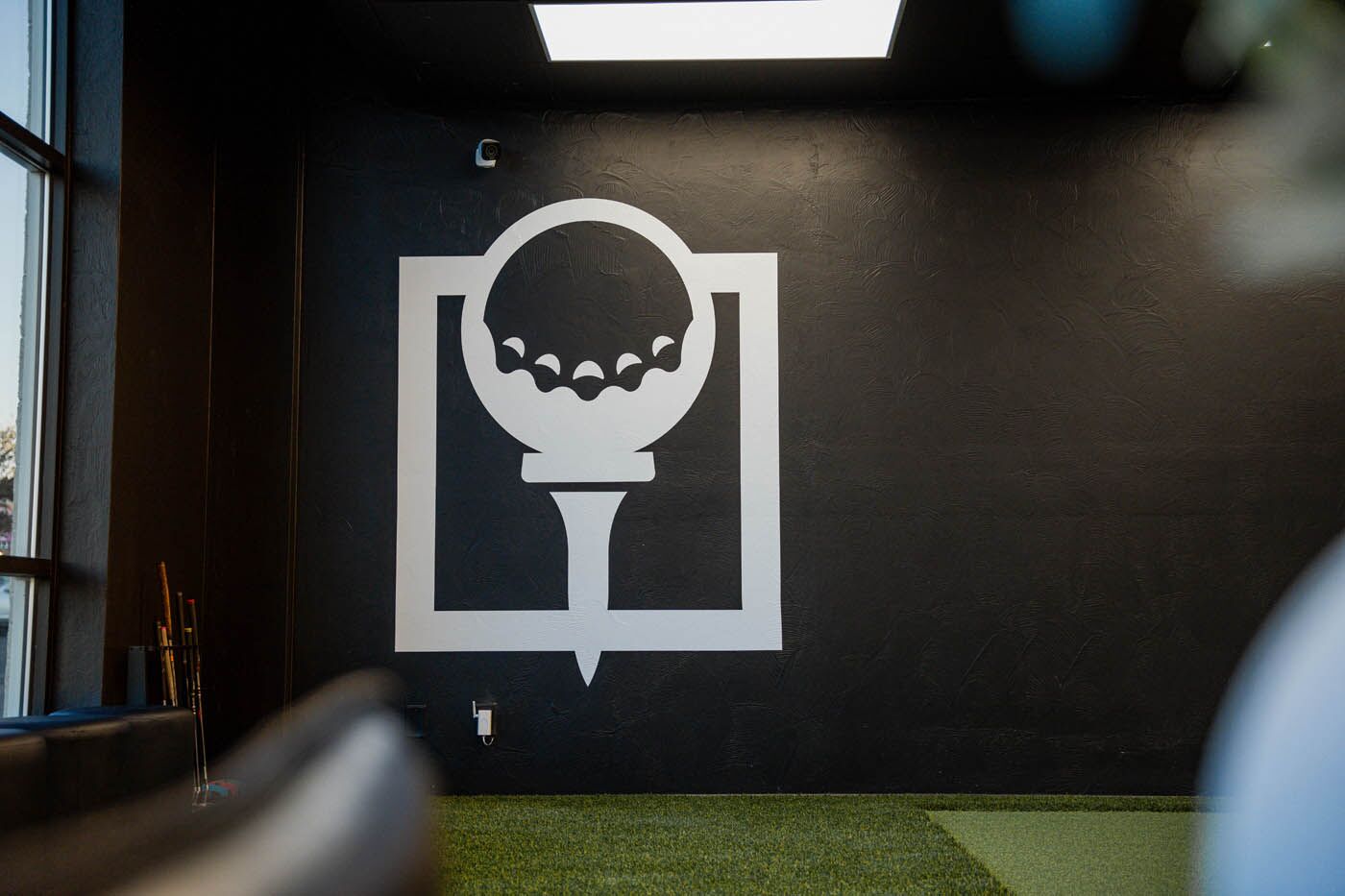 Tee Box St. George gym with Tee Box logo.