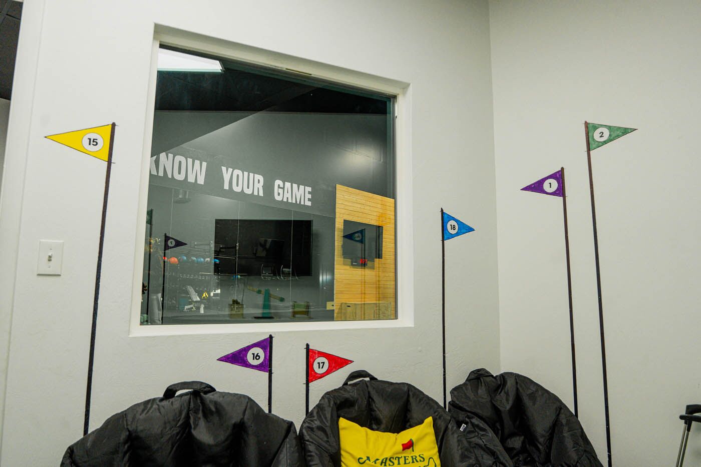 Tee Box St. George interior of playpen with window.