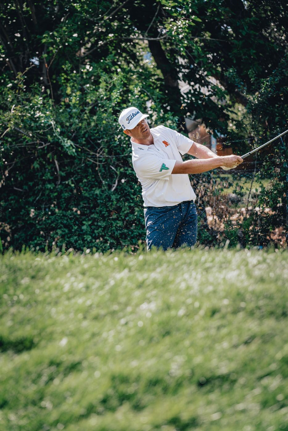 An image of athlete Patrick Fishburn hitting on the green - Tee Box Fort Lauderdale.