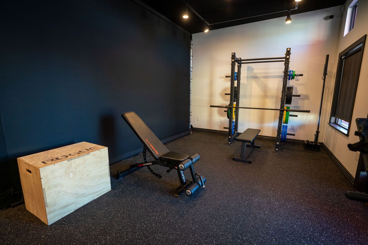Tee Box Morgan gym equipment area.